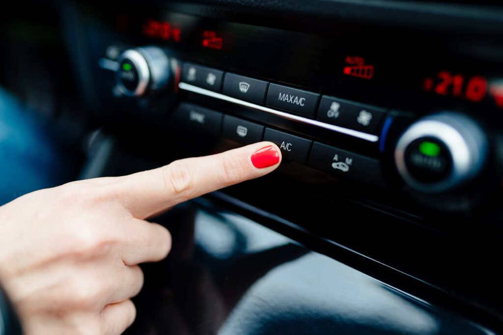 Why Is My Car’s Air Conditioner Blowing Warm Air? Common Causes and Solutions